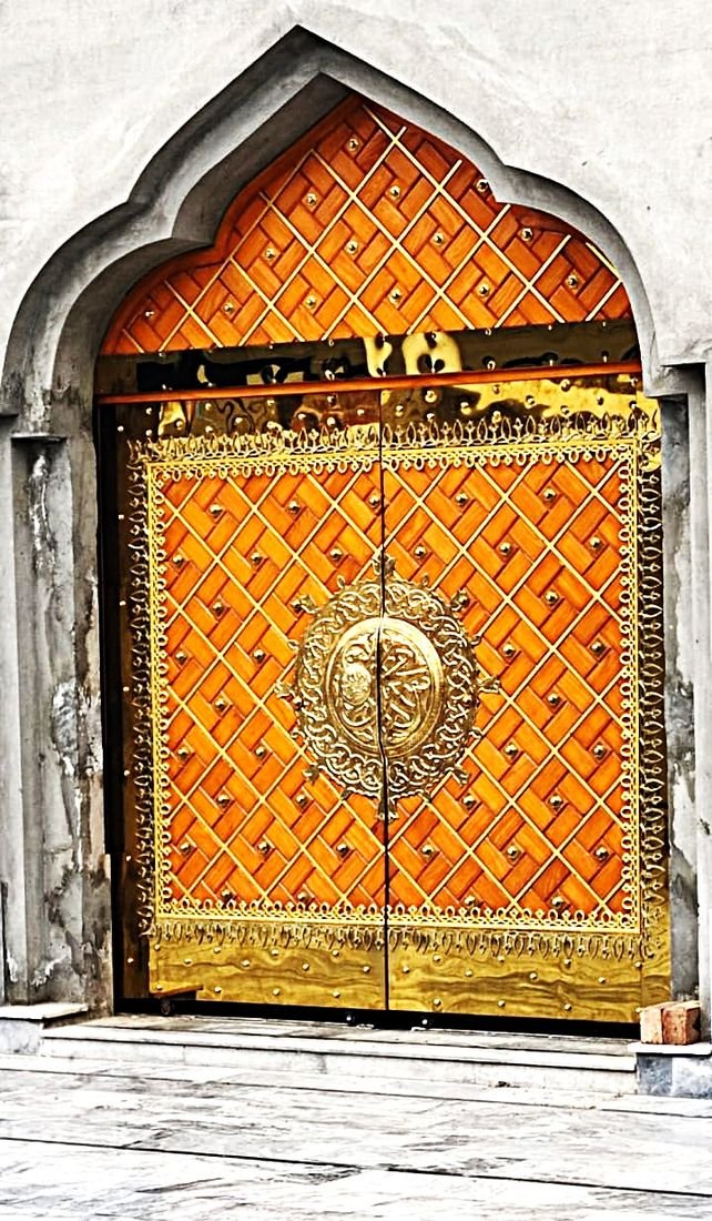 Featured entrance door, hand-built by Shahid Wood Works